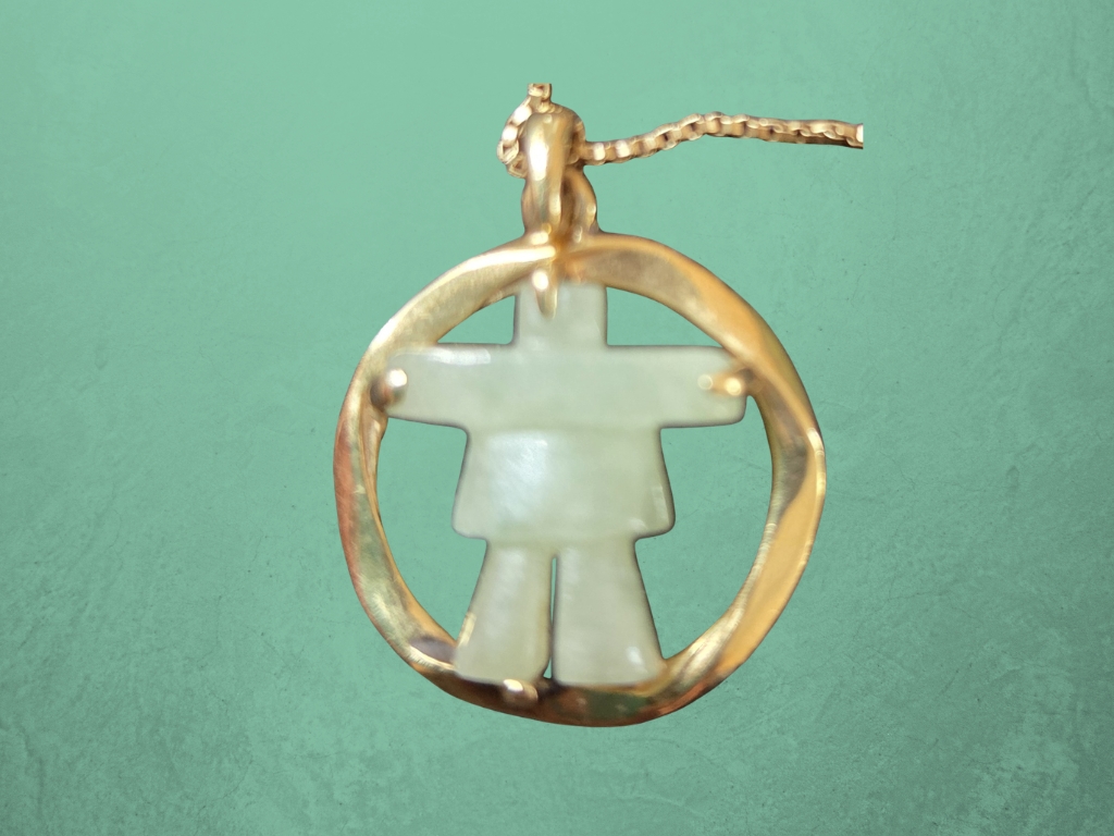 Inukshuk necklace that inspired building a backyard stone messenger