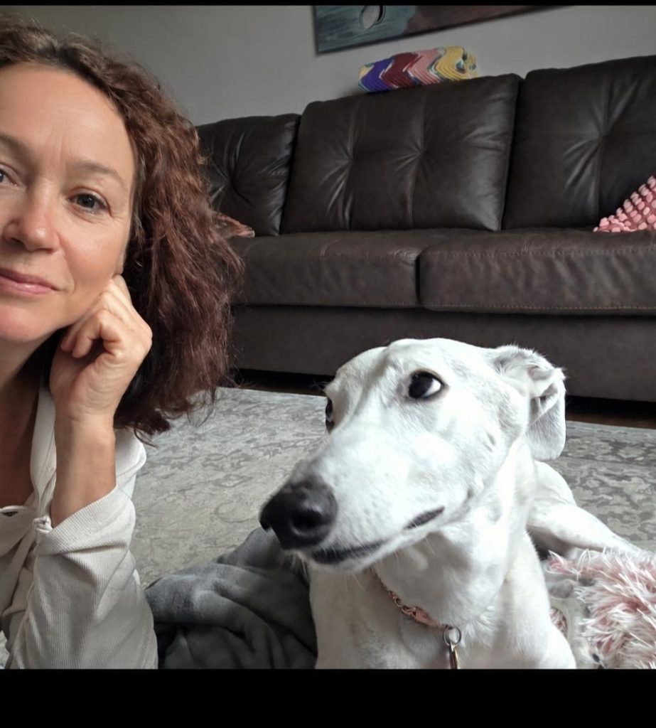 Chatting with a dog. Dog looking engaged in conversation